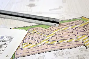 Residential Home Design Prints: Urban development plan on a desk