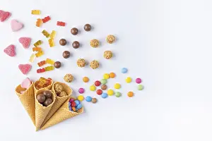 Ice Cream Cones Prints: Various sweets in and out of ice-cream cones on a white background