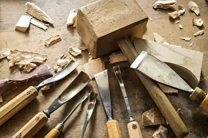 Austrian Craftsmanship Prints: Various woodworking tools on a workbench