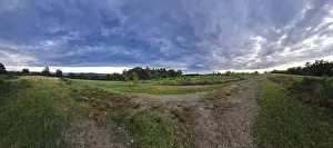 Protected Area In Germany Prints: Vast landscape with dramatic clouds and a meandering path