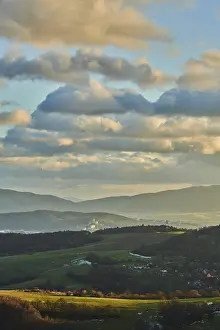 Agricultural Scenery Europe Prints: Vegetation of forests and fields in the hills with clouds in evening light