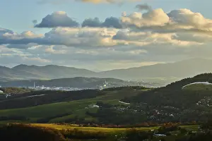 Atmospheric Evening Light Mood Prints: Vegetation of forests and fields in the hills with clouds in evening light