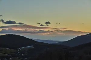 Uninhabited Farm Fields Prints: Vegetation of forests and fields in the hills with clouds in evening light