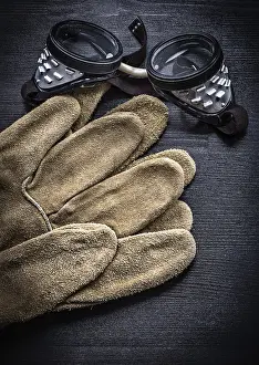 Close Up View Prints: Vertical view working goggles and protective gloves