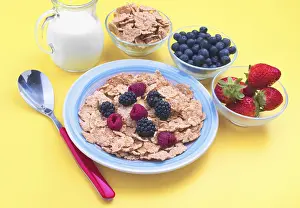 Yellow Background Food Photography Prints: A vibrant breakfast spread with cereal