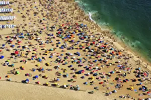 Colourful Parasols Prints: View from above of anonymous crowd