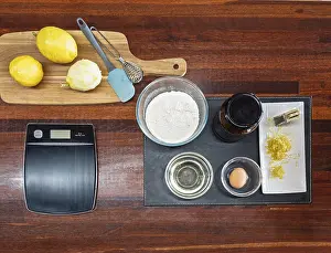 Kitchen Utensils For Baking Prints: A top view of baking essentials on a wooden table