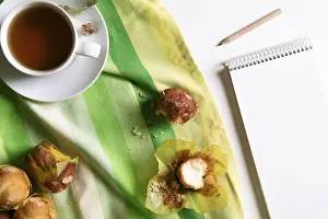 Breakfast Table Setup Prints: Above view of a breakfast table with a cup of linden tea