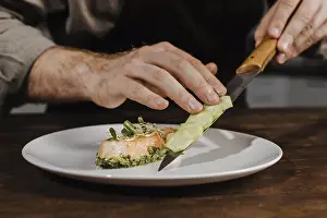 Basic Food Images Prints: Front view chef plating meal