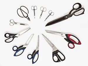 Studio Shot Of Scissors Prints: Top view of circle from various scissors on white background