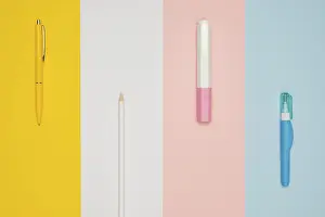 Colorful Stationery Set Prints: Top view different office pens