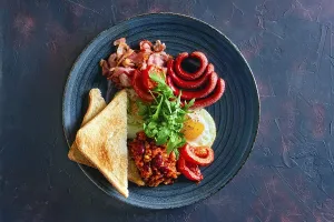 High Angle Food Shots Prints: Top view of fried egg, sausage