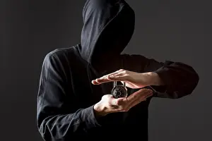 Data Protection Online Prints: Front view hacker holding lock