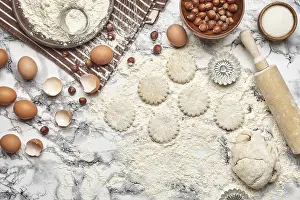 Baking Ingredients Prints: Top view of a kitchenware and baking ingredients on a marble table background