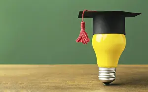 Symbolic Picture Learning Prints: Front view lightbulb with academic cap copy space