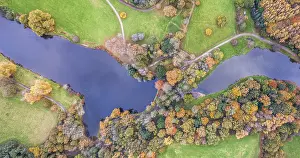 Autumn Mood In Great Britain Prints: Top Down view of Park, Pond and Trees in the colors of fall over Devon