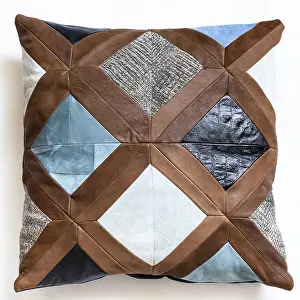 Isolated White Studio Background Prints: Top view of patchwork leather decorative pillow on white background