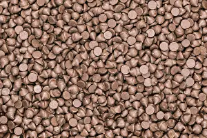 Sweet Treats Image Prints: Top view pile of chocolate chips as a background