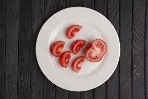 Colorful Still Life Prints: Top view of plate with tomato