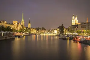 Prints of View over river Limmat at dusk, old town with Fraumunster, St. Peter and Grossmunster, old town, Zurich, Switzerland View over river Limmat at dusk, old town with Fraumnster, St Zurich Prints: View over river Limmat at dusk Zurich Switzerland Print