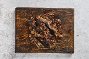 High Angle Food Shot Prints: Top view of serving board with fried beef bacon strips