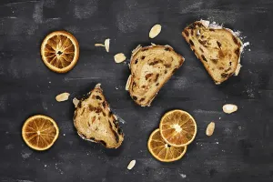 Dark Background Food Prints: Top view of slice of German Stollen cake