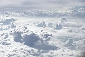 Aviation Photography Prints: View over towering clouds, cloudy sky