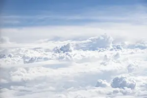 Aviation Photography Prints: View over towering clouds, cloudy sky