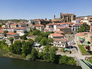 View From Above Spain Prints: View of a town with a river in the foreground