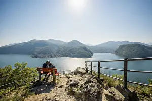 Mountain Peak Scenery Prints: Viewpoint with couple on a bench