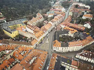 Prints of Vilnius, Lithuania - 30th november, 2024: aerial rising view The Angel of Uzupis.Vilnius old town and Bohemian Uzupis independent republic neighborhood area buildings.UNESCO World Heritage Site Related Prints: Vilnius, Lithuania Aerial Print - 30th November 2024