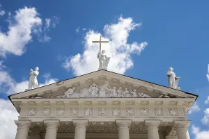 Prints of Vilnius, Lithuania - July 01, 2015 - Neoclassical cathedral facade with statues and cross against blue sky Vilnius Prints: Vilnius Neoclassical Cathedral Print - July 2015
