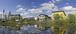 Prints of VILNIUS, LITHUANIA - MAY 07, 2016: Spring time in public garden association Kalorija on small lake bank near the village of Rastenenai. Sunny May day Lithuania Prints: Vilnius, Lithuania - Springtime Print