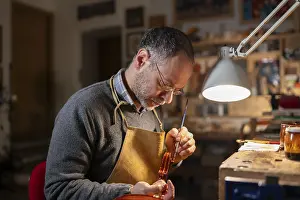 Images Dated 3rd December 2024: Violin Maker at Work Print, Detail of Tools and Materials