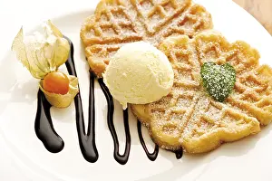 Studio Shot Desserts Prints: Waffles on a plate with physalis