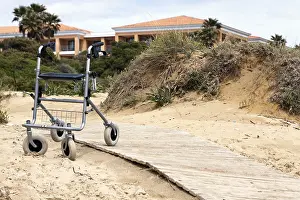 Physical Disability Support Prints: Walking frame left on the beach