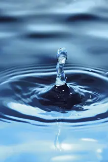 Blue Background Studio Shot Prints: Water drop