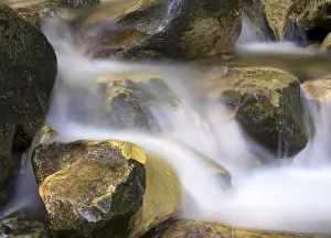 Uninhabited Waterfalls Prints: Water stream falling on a rock