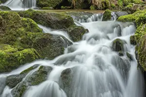 Uninhabited Mountain Torrent Prints: Waterfall on a mountain stream in spring