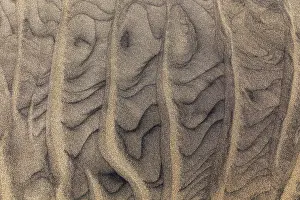 Undulating Surface Texture Prints: Wave pattern, structures in the sand on the sandy beach