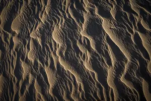 Deserted American Shoreline Prints: Wave structures in the bright sandy beach