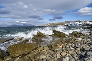 Mediterranean Beach Scene Prints: Waves breaking between the rocks on the beach