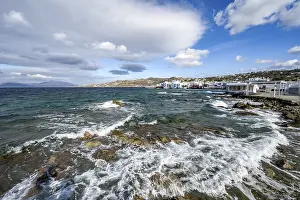 Mediterranean Beach Scene Prints: Waves breaking between the rocks on the beach