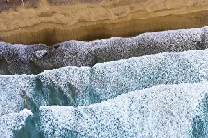 Canary Islands Coastal Area Prints: Waves running out at sandy beach