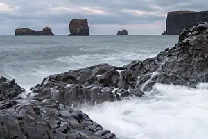 Basalt Column Prints: Waves, surf, washed over columnar basalt