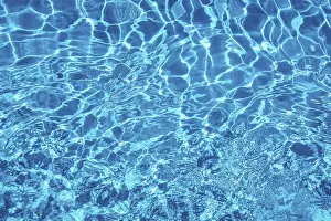Blue Water Surface Prints: Wavy blue water surface with reflections