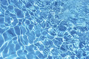 Wavy Water Surface Prints: Wavy blue water surface with reflections