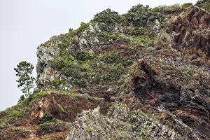 Uninhabited Coastal Landscape Prints: Weathered lava rocks on the cliffs