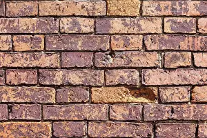 Weathered Brick Wall Prints: Weathered stained old brick wall as background