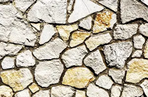 Creative Background Texture Prints: Weathered stone wall as creative background texture